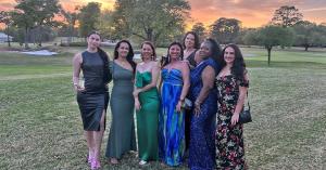  The California Closets Wilmington Team gathered on a golf course