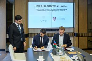 NEQSOL and Swiss GRC sign agreement