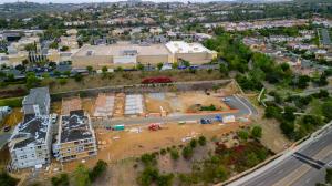 Vacant lot next to La Costa Town Square shopping center in Carlsbad, California, where 19 new affordable apartments will be built under a $5.8-million contract awarded to Level 3 Construction.