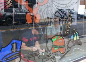 The “Service is a Lifestyle” mural and “Warriors HeArt Gallery” represents the dedication of warriors to servicing their community. The helmets represent the population Warriors Heart serves, which includes military, veterans and first responders.
