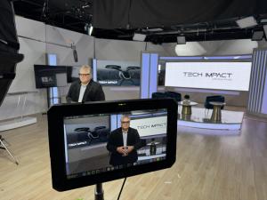 3. TECH IMPACT - standing with cameras