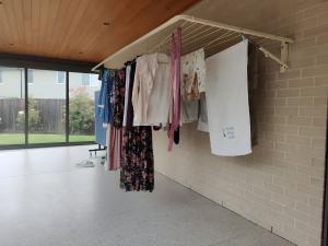 eco 300 fold down clothesline mounted to brick wall