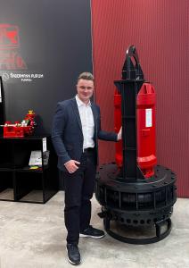 Our Sales Rep with one of Habermann Aurum Pumpen Heavy duty pumps displayed at an exhibition.