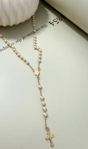 Elegant 18K gold-filled rosary necklace with pearl beads and crucifix. Waterproof, hypoallergenic, and perfect for gifting or everyday faithwear.