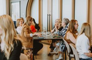 Group of professional women attending Elevate Your Leadership Presence, the Calgary event that launched WATT—Women Advancing and Thriving Together, a leadership accelerator for women.