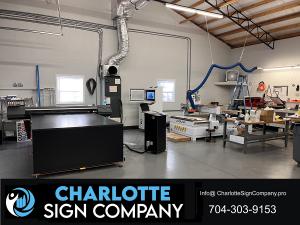 Charlotte Sign Company has flatbed printers and CNC shaping machines.