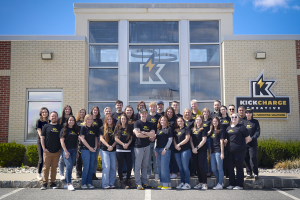 KickCharge Creative team stands in front of KickCharge headquarters in Washington, NJ.