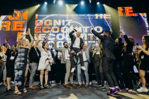 CEO of Experior Jamie Prickett and crowd celebrating on stage Experior Factor 2025