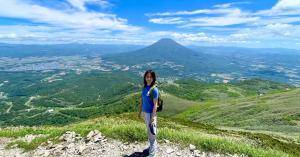 EdVenture campers hiking Mt. Annupuri with Mt. Yotei backdrop