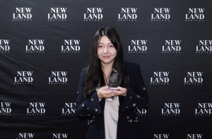 Person holding award