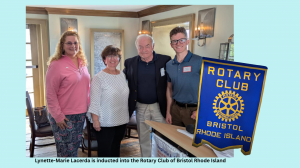 4 people standing and rotary of bristol RI banner