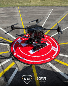 The Xer Tech X8 UAS sitting on a landing pad
