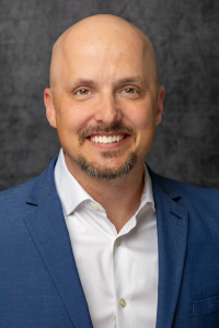 Headshot of Adam Liddle