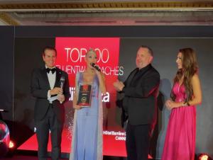 Aliia Roza wearing Tess Mann Atelier receives Top 100 Influential Coaches award at the I Success Awards ceremony. Photo used with permission ©AliiaRoza.