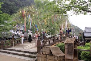 Traditional Japanese wind chimes and Tanabata streamers hanging in Edo Wonderland, evoking the feeling of summer.