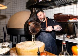 Creating classic pasta dishes (Photo Credit: Little Charli)