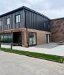 Piping Systems Ins. (PSI) Celebrates Expansion with a Ribbon Cutting at Its New HQ in Historic Assonet Mill