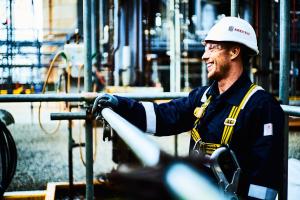 Kaefer maintenance worker with branded hard hat