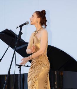 Nashville-based fashion brand Tess Mann Atelier is honored to announce that its signature Felicity gown was worn by acclaimed singer and actress Chrystabell at the prestigious Tribute to David Lynch and Cerrone during the Cannes Film Festival Chrystabell wears Tess Mann Atelier on stage at Tribute to David Lynch and Cerrone in Cannes, France. Photo used with permission @chrystabellofficial.
