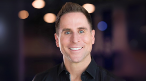 Brad Habermel, Co-Owner of Cheer Athletics, named Dallas Team Manager in the new Varsity Pro Cheer League, smiling in professional headshot.
