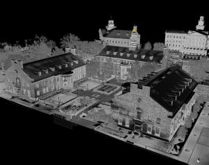 3D point cloud of the SMU Cox School of Business, showing a greyscale rendering of a historical building complex with pitched roofs, chimneys, and multiple windows.