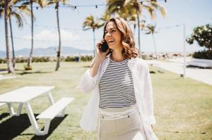 Prosperity Of Life is proud to welcome Brooke Davies, a Townsville-based single mum and former finance professional, into its exclusive 50K Club, recognizing individuals who have earned over $50,000 USD profit within a single 30-day period Brooke Davies smiling outdoors, representing her success as a Prosperity Of Life entrepreneur.