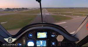 Two people in an electric training aircraft