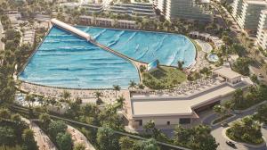 A vibrant surf park scene in Bahrain featuring crystal-clear artificial waves, tropical palm trees, and relaxed beach vibes. Surfers ride waves under the sun while guests lounge in cabanas, capturing the spirit of Hawaii in a modern, Middle Eastern settin