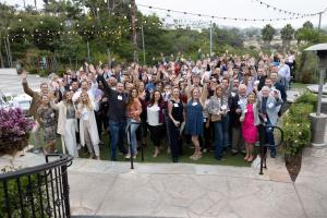Optima anniversary party group shot