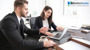 Lawyers working on legal software