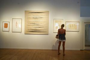 23384828 guest taking in artwork