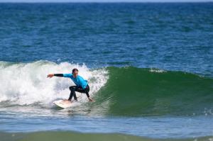 Surfer in action during the Point Mugu Surf Contest