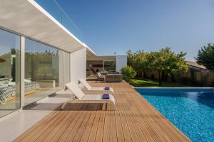 A modern villa in Portugal with a pool