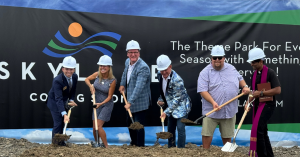 Photo of dignitaries and executives with shovels and hard hats on the first dig at the SkyLake groundbreaking ceremony, July 18, 2025