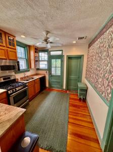Move-in ready 3 BR/1 BA home Tudor Revival style home on .12 +/- acre lot in the Bellevue neighborhood of Richmond, VA. The home measures 1,600 +/- sf. and features an eat-in kitchen (all appliances convey), living room, dining room, utility room housing