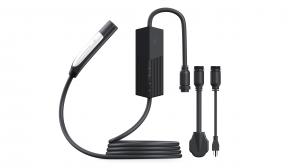 Black portable EV charger with NACS connector, coiled cable, and a control unit featuring 16A–40A current indicators.
