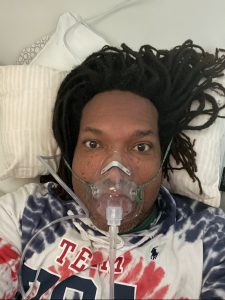 William Person receiving oxygen in his HBOT chamber