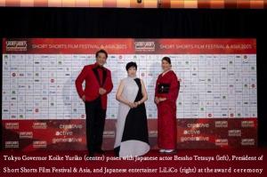 Tokyo Governor Koike Yuriko (center) poses with Japanese actor Bessho Tetsuya (left), President of Short Shorts Film Festival & Asia, and Japanese entertainer LiLiCo (right) at the award ceremony