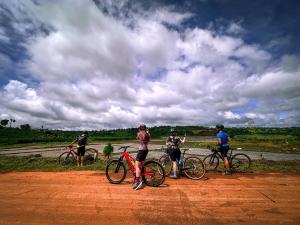 Gravel riders stopping for a break on a road in southern Vietnam