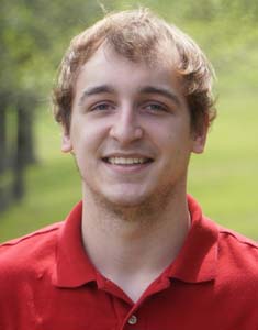 Gavin Hall, a young college student and basketball player, smiling confidently in a head-and-shoulders portrait