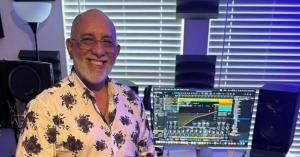 Osmer Martinez Ramos, music producer and dual voting member of the GRAMMYs and Latin GRAMMYs, pictured in his recording studio representing Latin music excellence