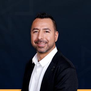Professional headshot of Josh Towers, the Principal Broker and founder of Sell For One Realty, a Las Vegas real estate brokerage.