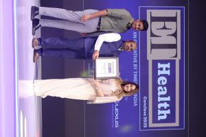 Dr. Mohana Rao Patibandla receiving an award at the ET Health Conclave 2025, presented by a celebrity host, with the ET Health logo in the background. Ask ChatGPT