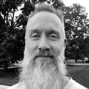 Headshot photo of Jesse Kuhn, Author Always Here - Death of a Spouse
