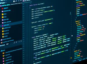 Screenshot of colorful PHP and JavaScript code in a development environment, representing KRAMBU’s sponsorship of the Open WebUI open-source AI project.