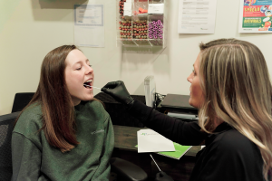 People seeking recovery are finding relief faster with a genetic test that takes the guesswork out of finding mental health medication in the Wabash Valley Medical staff using a cheek swab DNA test on a patient