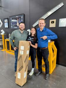 George Mayfield and Herb Kulp deliver a prize to Titans of CNC in Lewisville, TX