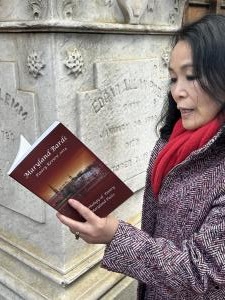 Qin Sun Stubis reads her poem at Poe's grave in Baltimore