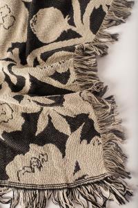 Closeup of Addy woven blanket in textured pattern, in color Tuffet, designed by Melissa McKeagney, made in the USA by Kindly Woven.