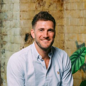 A professional headshot of Dan Kerr, the CEO of Service.com.au.